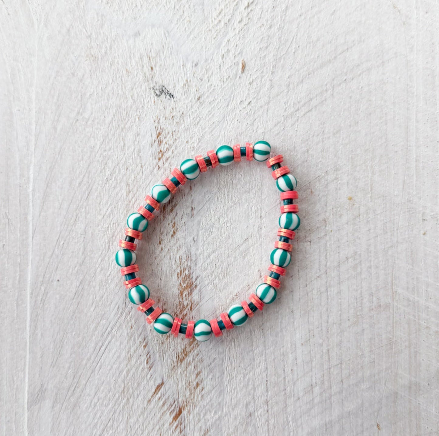 Beaded bracelet with pink and green beads