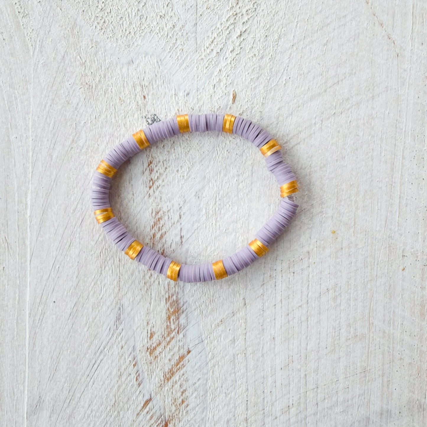Necklace with purple and gold beads 