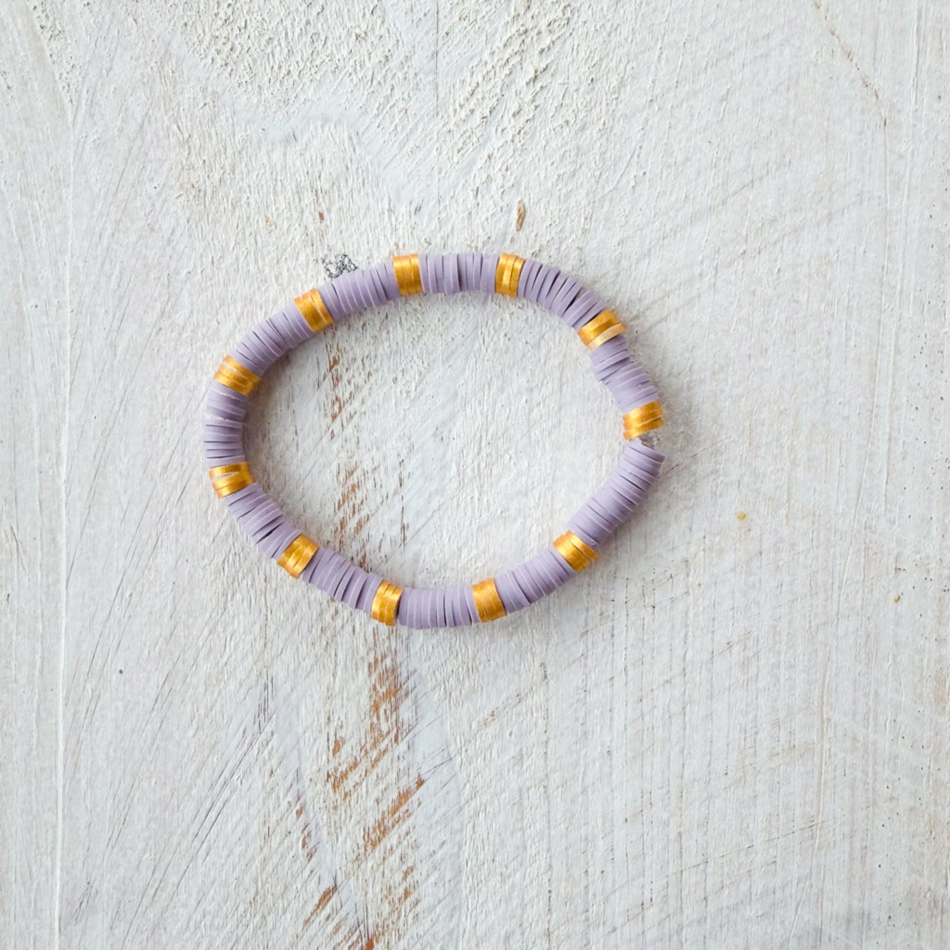 Necklace with purple and gold beads 