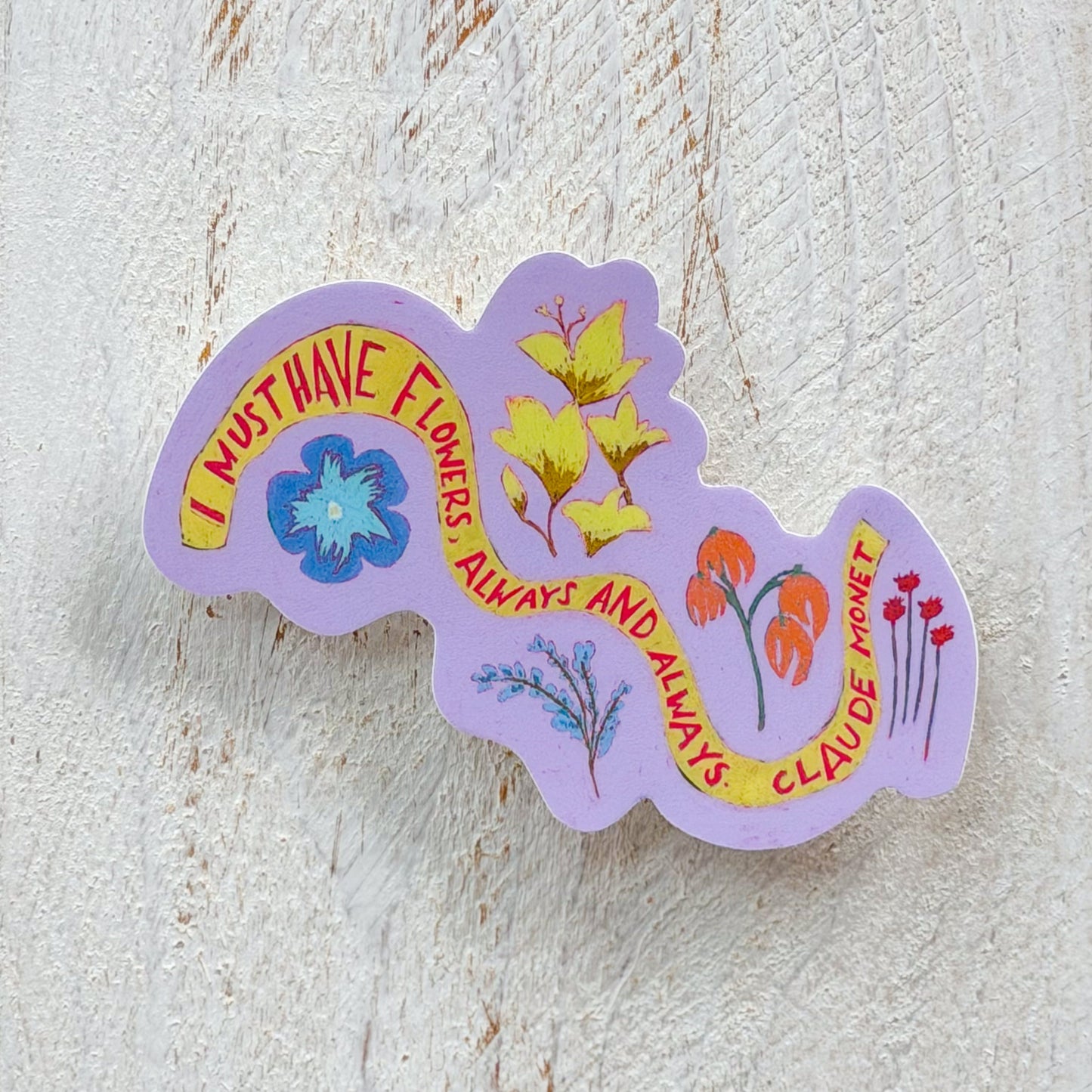 Decorative sticker with floral design and quote by Claude Monet