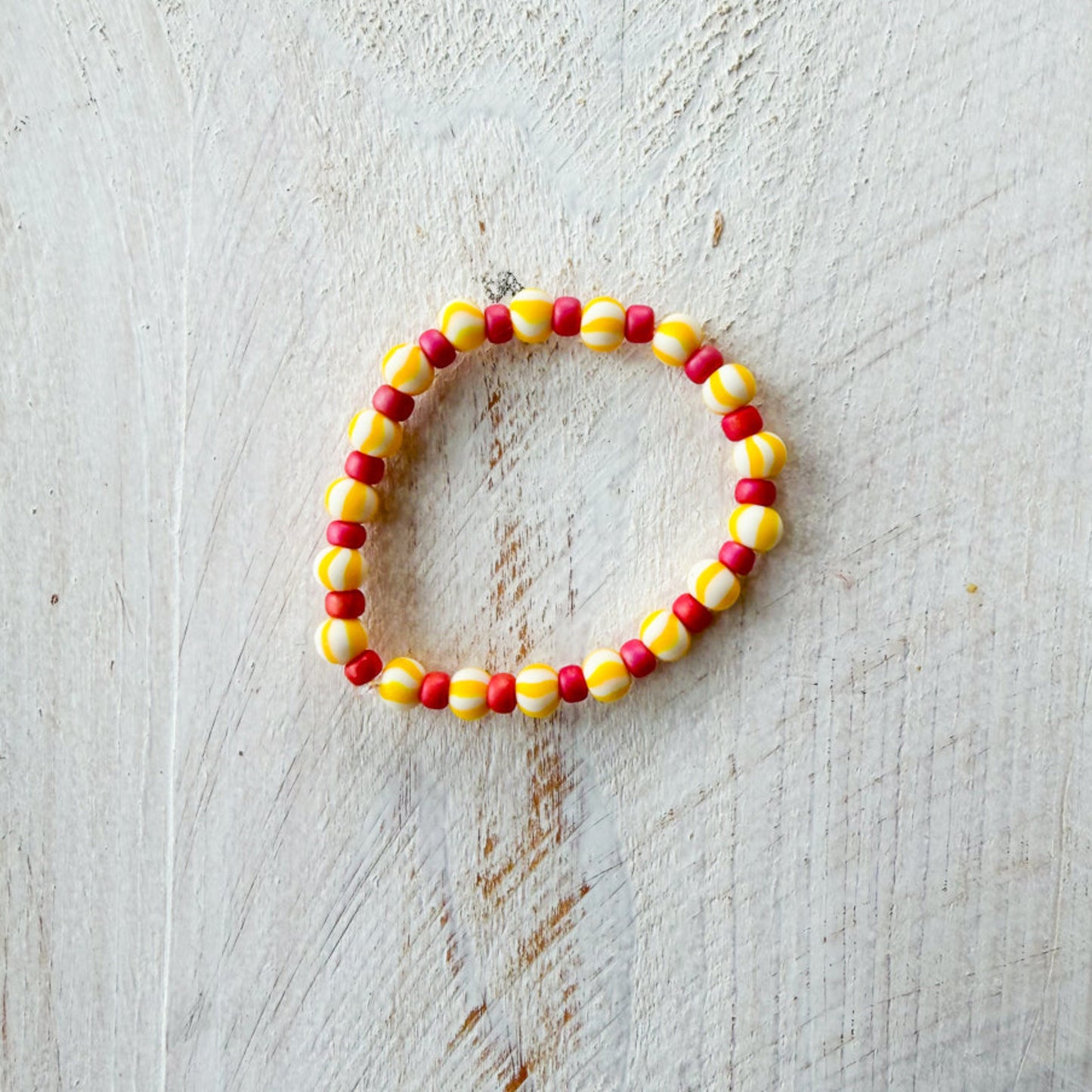 Beaded bracelet with red and yellow beads